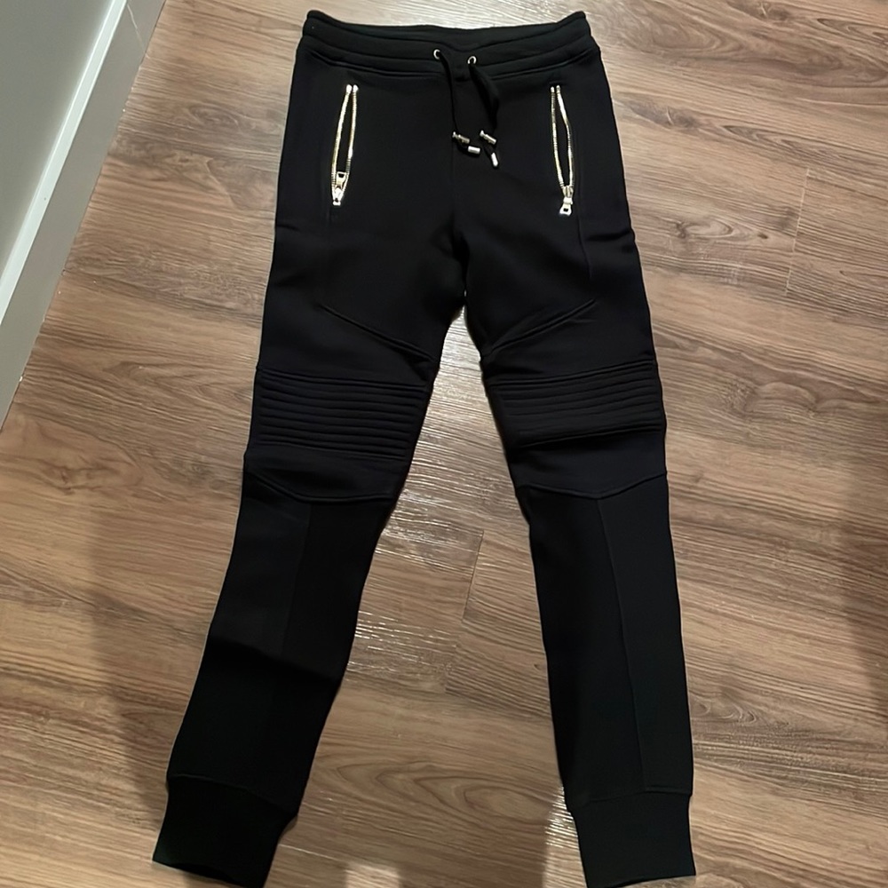 Men’s Balmain sweatpants with gold hardware
